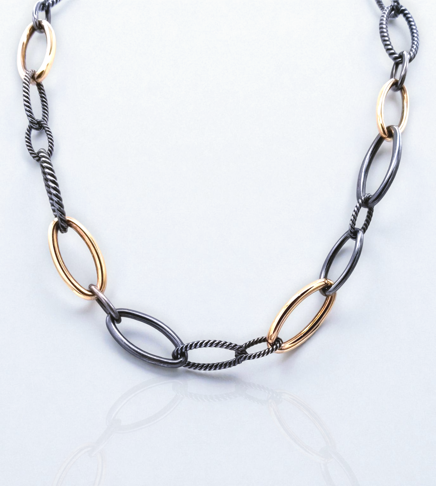 [NE08193] STER-18KP twisted and smooth oval links necklace