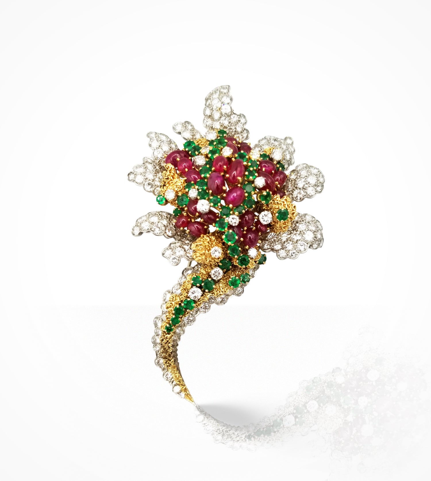 1100406 Estate 1100406 Platinum and 18kt yellow gold Ruby, Emeralds and diamond Brooch. Price upon request.